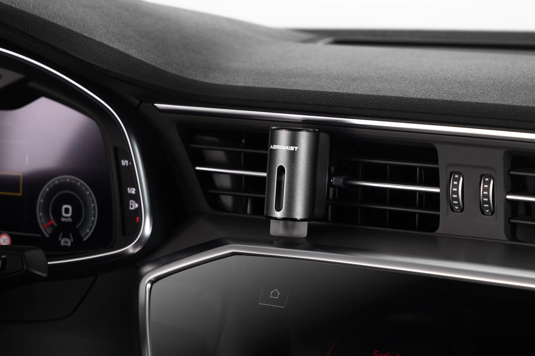 AeroMist fitted to a car dashboard vent